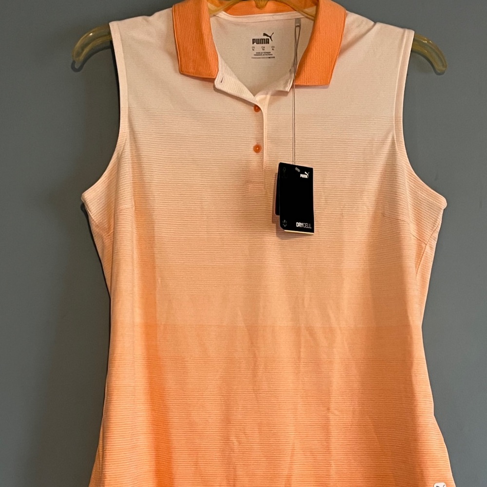 SELLING PUMA SPORTS FOR WOMEN SIZE Xl BNWT COLOR ORANGE SLEEVELESS